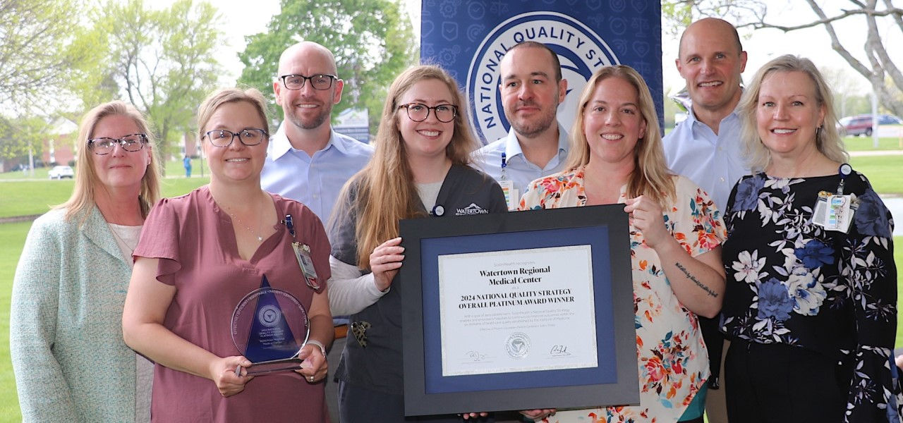 Watertown Regional Medical Center staff receiving NQS plaque