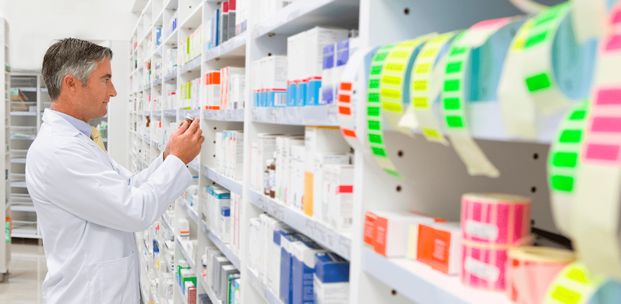 Pharmacist looking at medications