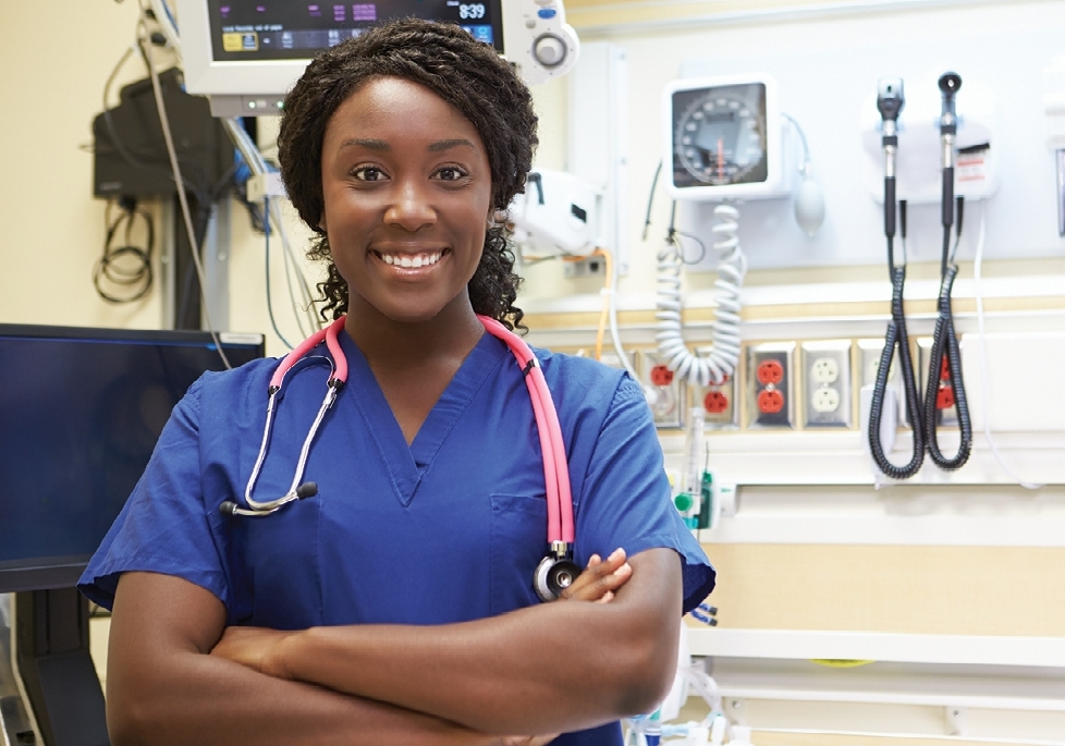 Nurse smiling with arms crossed